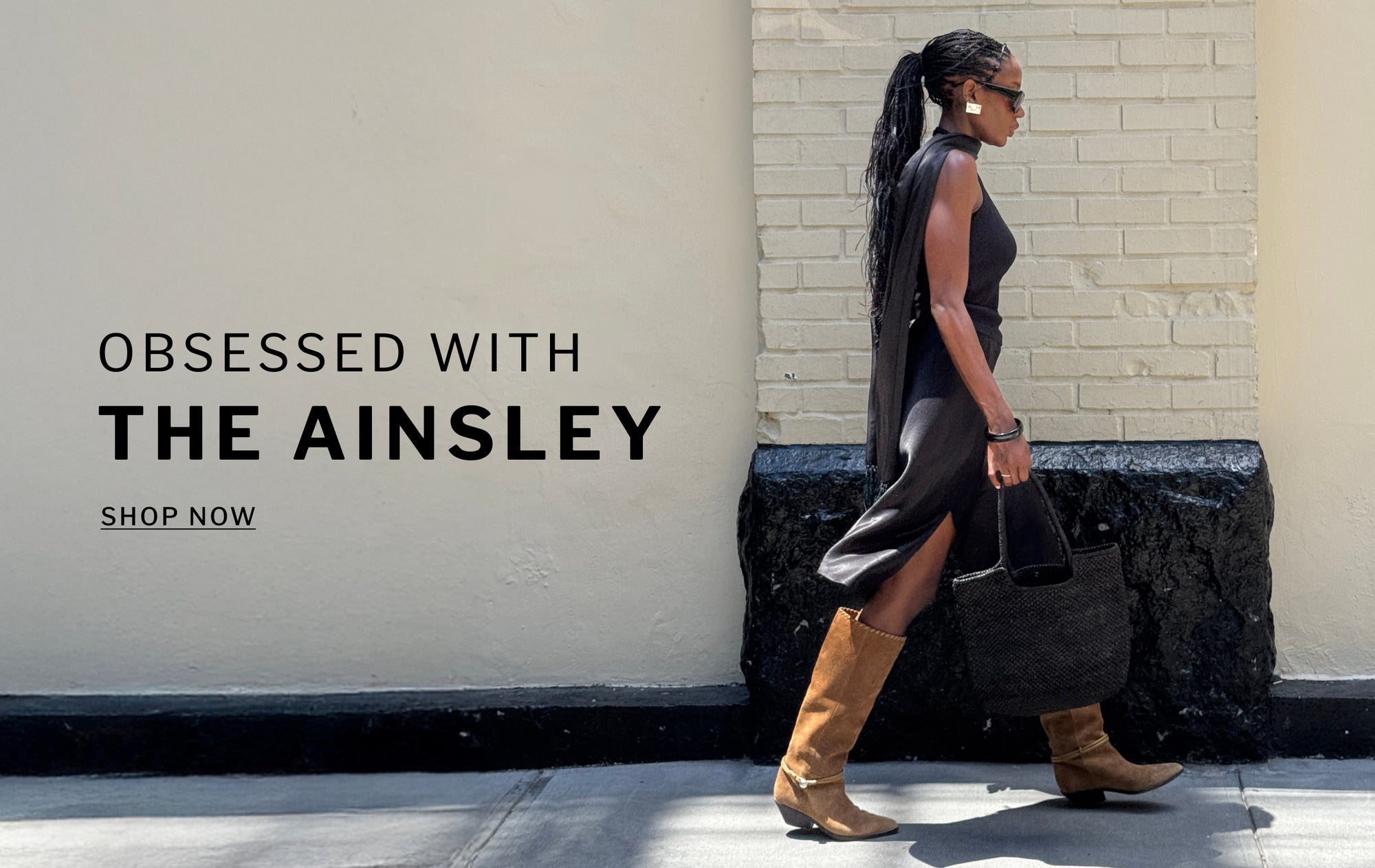 Editorial banner featuring model wearing Ainsley Boots