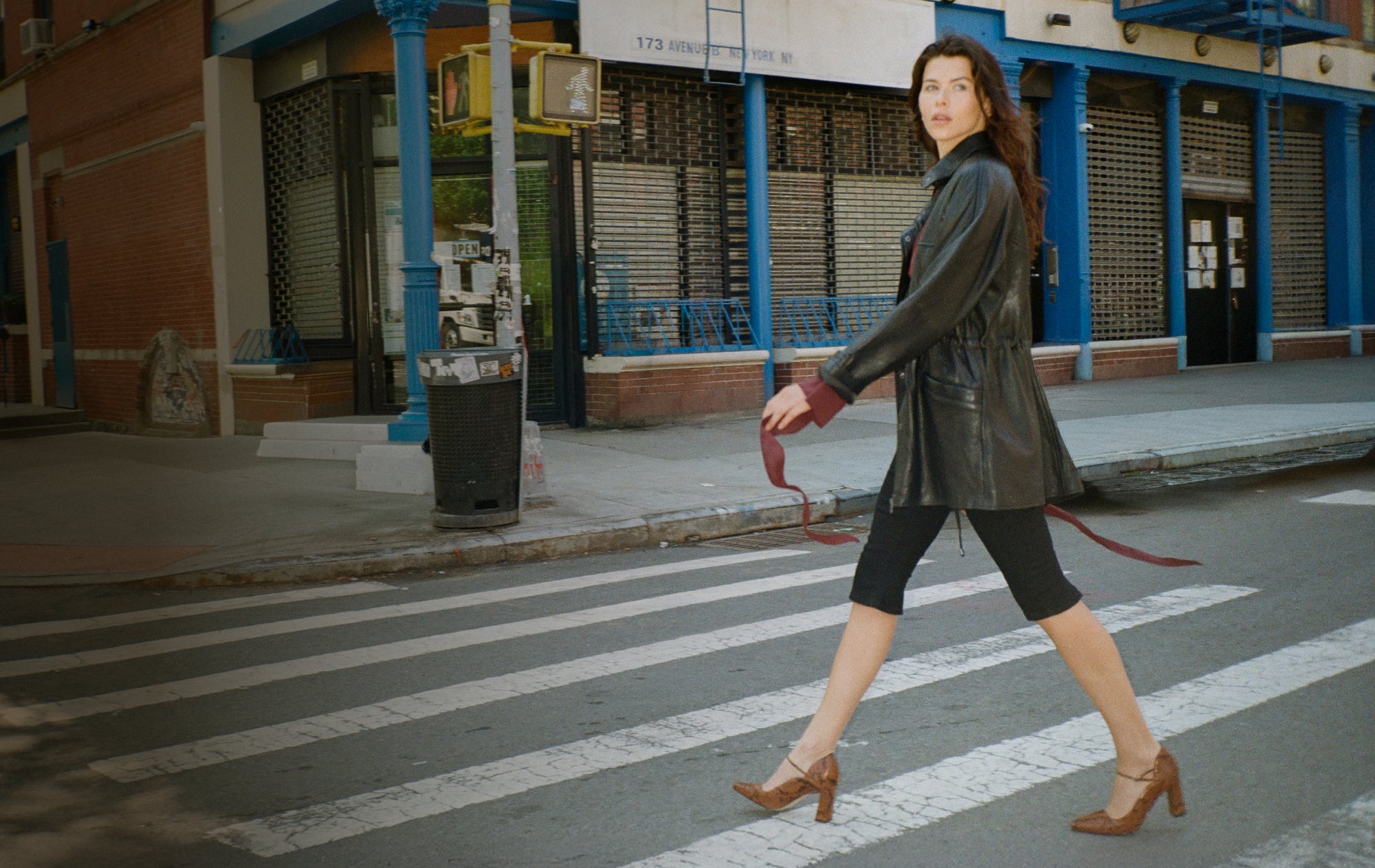 Editorial banner featuring model wearing block heels
