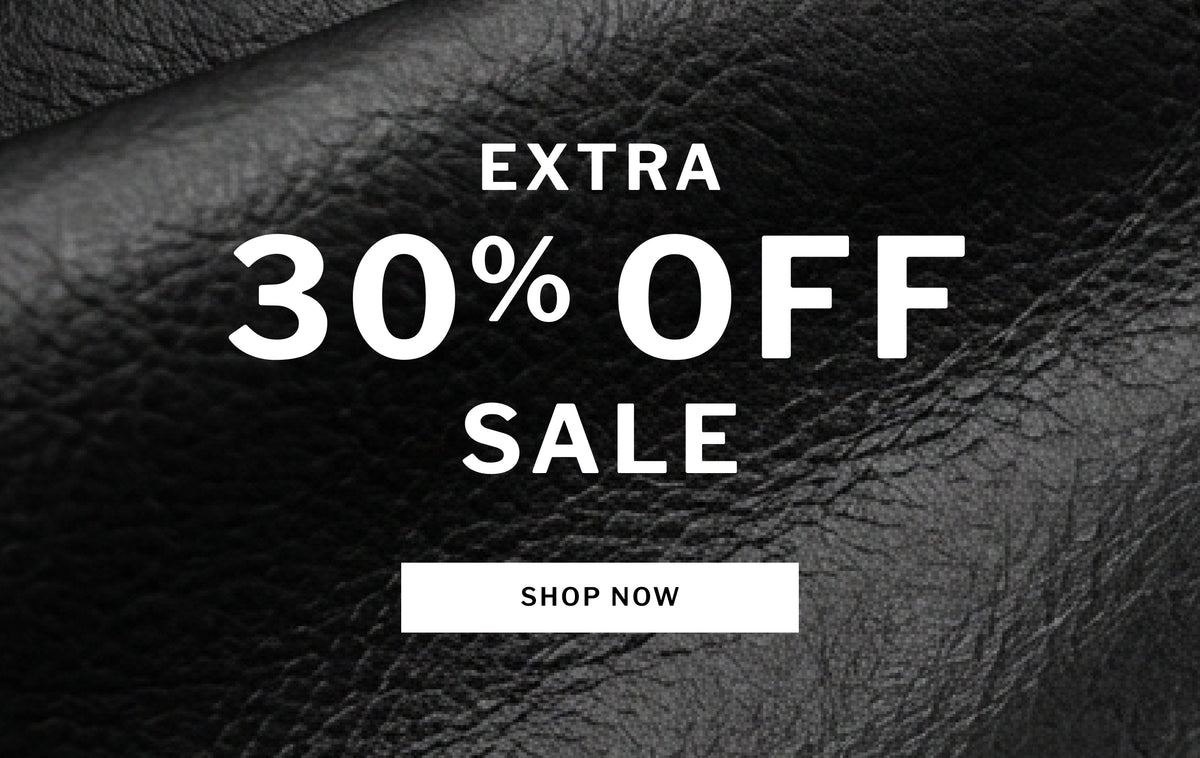 Promotional sale graphic with the text 'EXTRA 30% OFF SALE' in white over a black textured leather background, with a white 'SHOP NOW' button at the bottom.