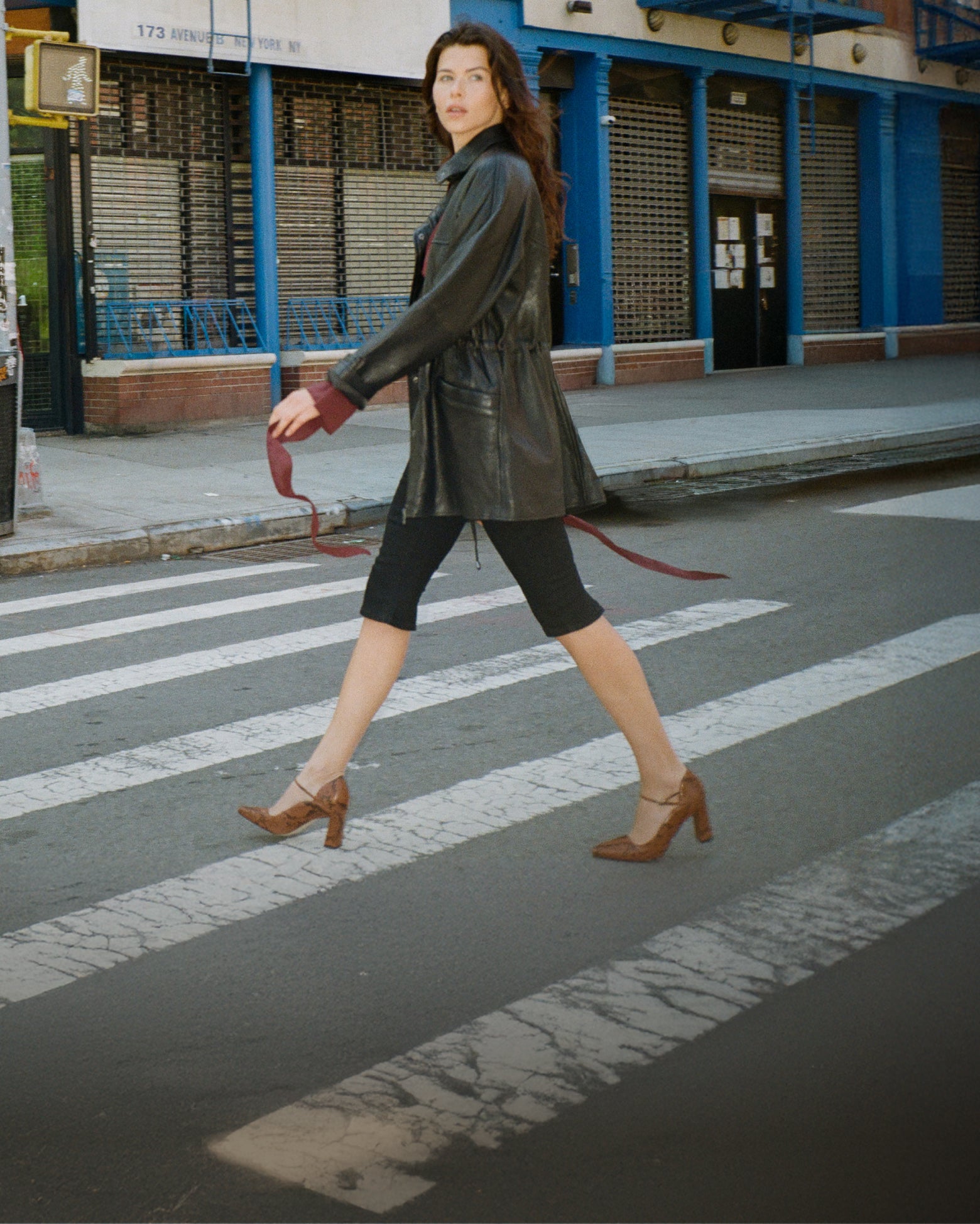 Editorial banner featuring model wearing block heels