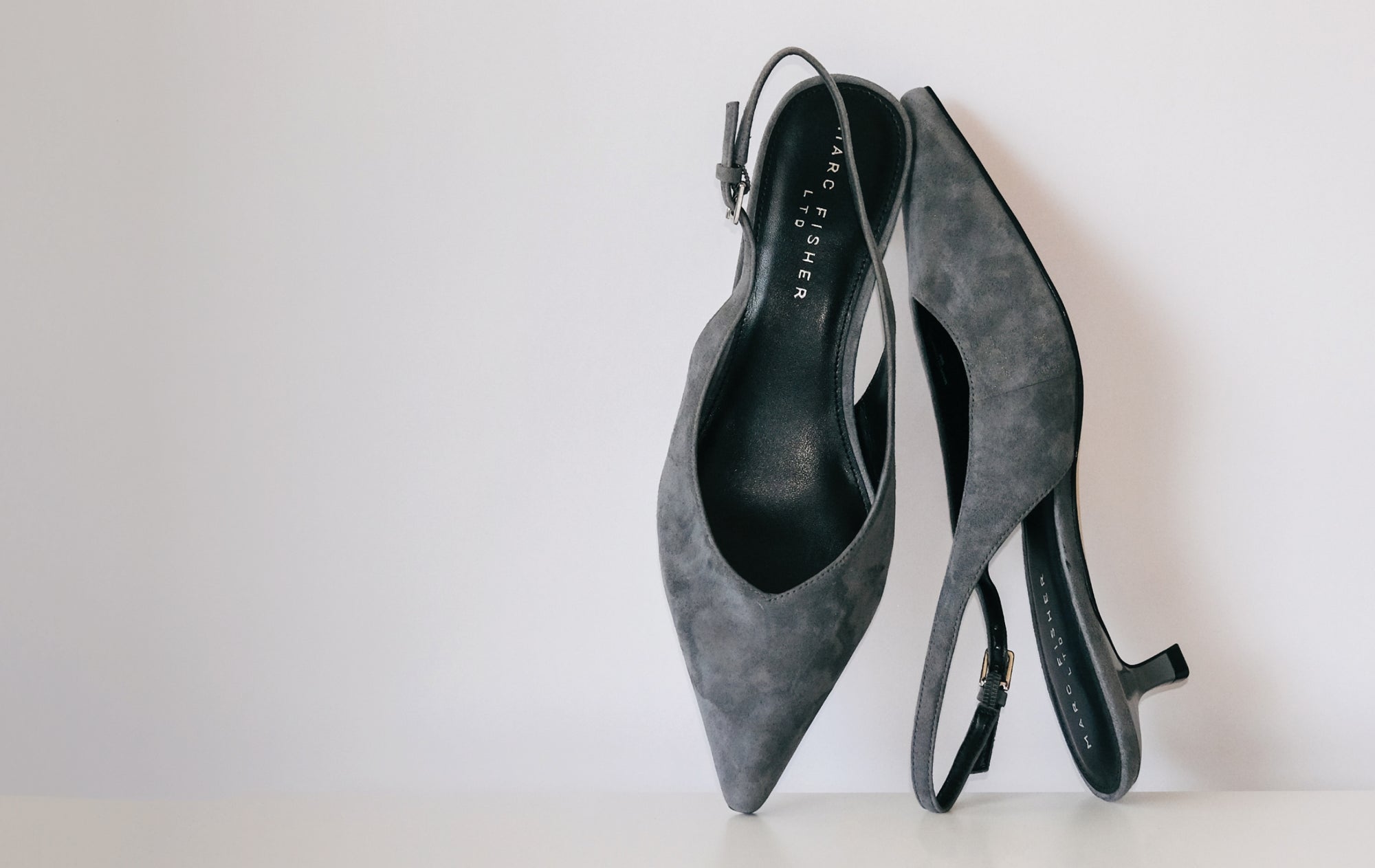 Editorial banner featuring kitten heels