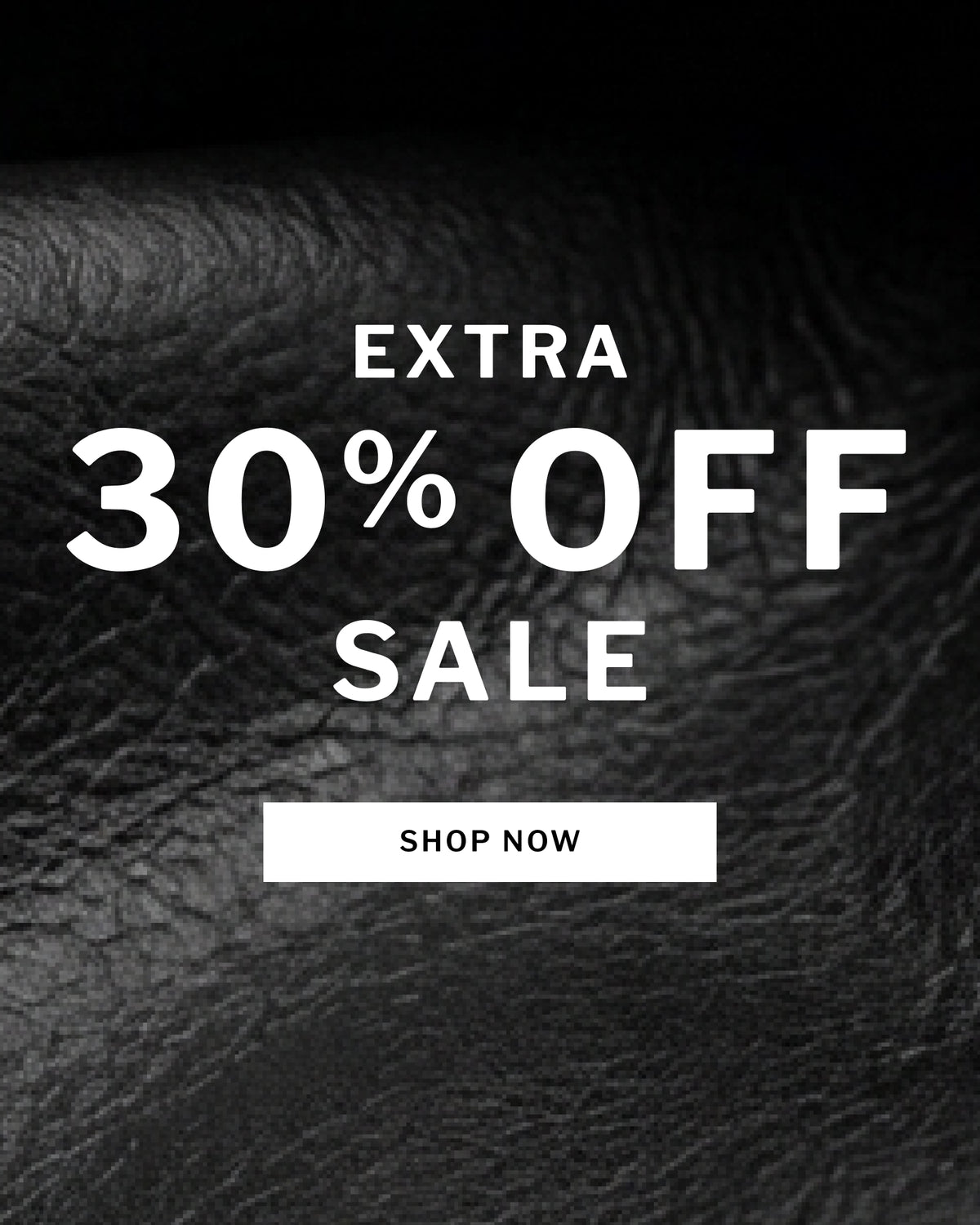 Promotional sale graphic with large white text reading 'EXTRA 30% OFF SALE' and a white 'SHOP NOW' button over a dark textured leather background.