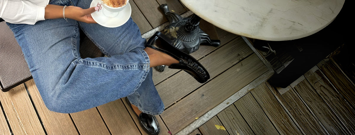 Editorial banner featuring model wearing loafers