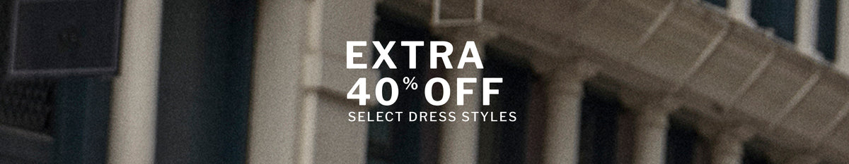 Promotional banner with the text 'EXTRA 40% OFF SELECT DRESS STYLES' in white over a blurred architectural background.